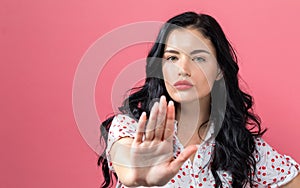 Young woman making a rejection pose