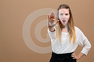 Young woman making a rejection pose