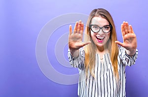 Young woman making a rejection pose