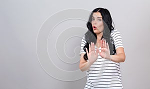 Young woman making a rejection pose