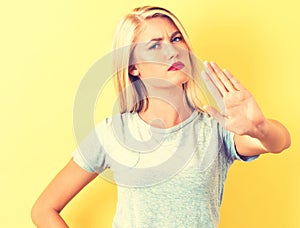Young woman making a rejection pose