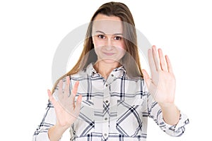 Young woman making a rejection pose in white background