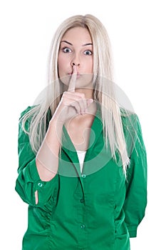Young woman making silent sign isolated on white.