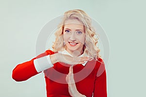 Young woman making time-out gesture