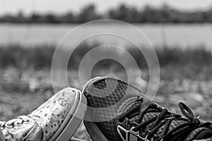 Young woman and man legs shod in running shoes