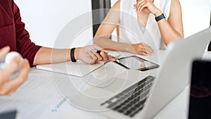 Young woman and man studying for a test or exam Tutor books with friends catching up and learning, education and school concept