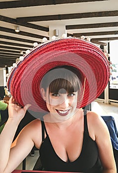 Young woman with Mariachi hat