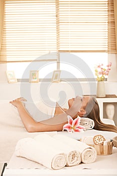 Young woman in massage parlour photo