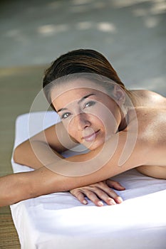 Young woman on massage table