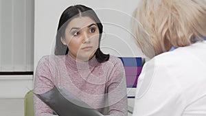 Young woman at medical appointment at the hospital