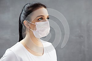 Young woman in medical mask