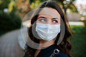 Young woman in medical mask during coronavirus