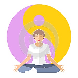 Young woman meditates in the lotus pose with yin-yang sign.