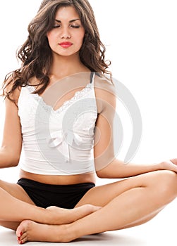 Young woman in meditation pose