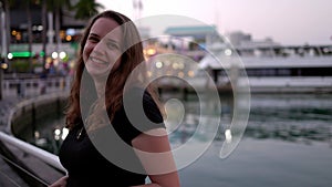 Young woman at Miami Bayside - close up shot in the evening