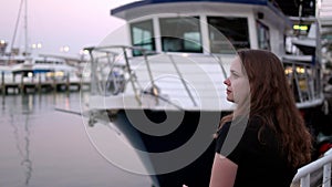 Young woman at Miami Bayside - close up shot in the evening