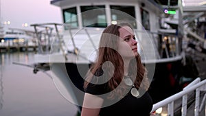 Young woman at Miami Bayside - close up shot in the evening