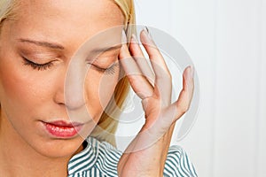 Young woman with migraine headache photo