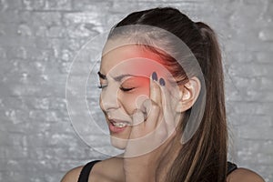 Young woman with migraine headaches