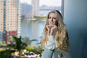 Young woman on morning at the balcony.