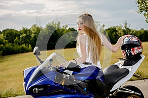 Young woman with a motorcycle speed
