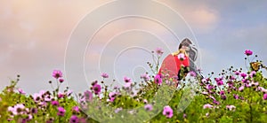 young woman mountain biking in blooming country lanes