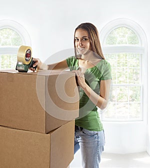 Young woman moving to a new home