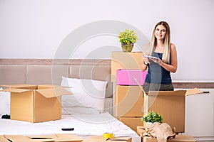 The young woman moving to new place