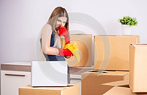 Young woman moving to new place