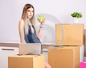 Young woman moving to new place