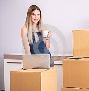 Young woman moving to new place