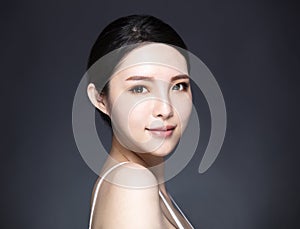 Young woman with natural makeup and clean skin