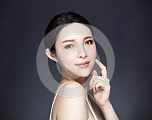 Young woman with natural makeup and clean skin