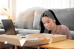 Young woman with no appetite, tired, bad mood. Asian women have anorexia photo