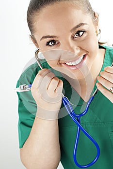 Young woman nurse holding a stethoscope