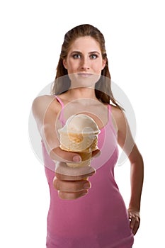 Young woman offering ice cream in waffle cone