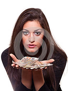 Young woman offering money