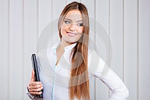 Young woman office worker hold case with files.