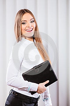 Young woman office worker hold case with files.