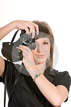 Young woman with old camera