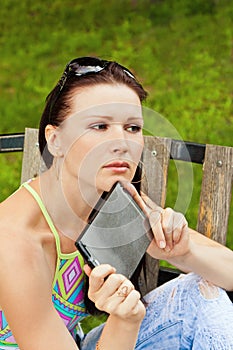 Young woman outdoor with tablet PC