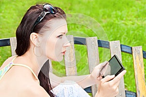 Young woman outdoor with tablet PC