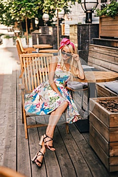 Young woman outdoors portrait. Soft sunny colors.