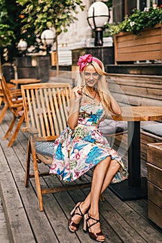 Young woman outdoors portrait. Soft sunny colors.