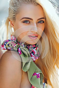 Young woman outdoors portrait. Soft sunny colors.