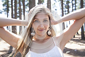 Young woman outdoors portrait. Soft sunny colors.