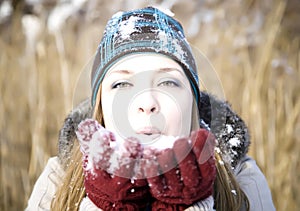 Young woman outside in the snow