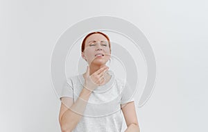 Young woman with pain in head. Sore throat,toothache. Headache migraine. White background