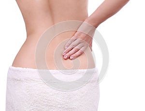 Young woman with pain in her lower back