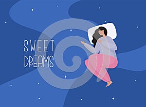 Young woman in pajamas sleeping on soft pillow. Sweet dreams, good health concept